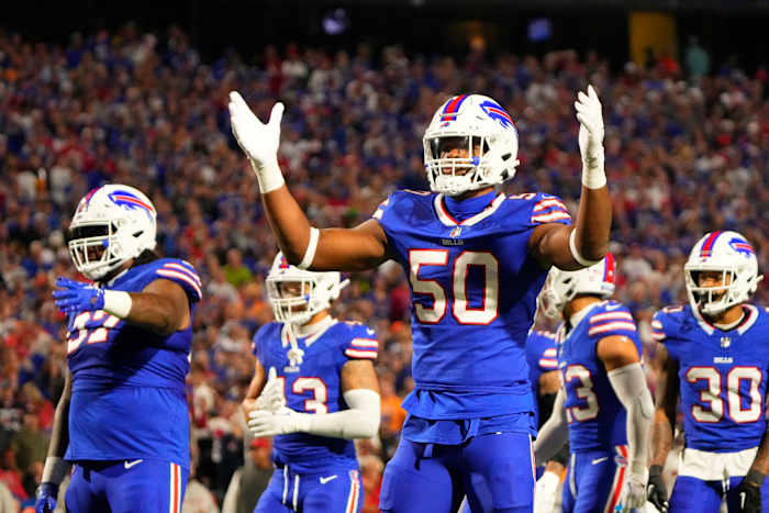 Buffalo Bills defensive end Greg Rousseau (50) gestures during the first half against the Tampa Bay Buccaneers at Highmark Stadium.